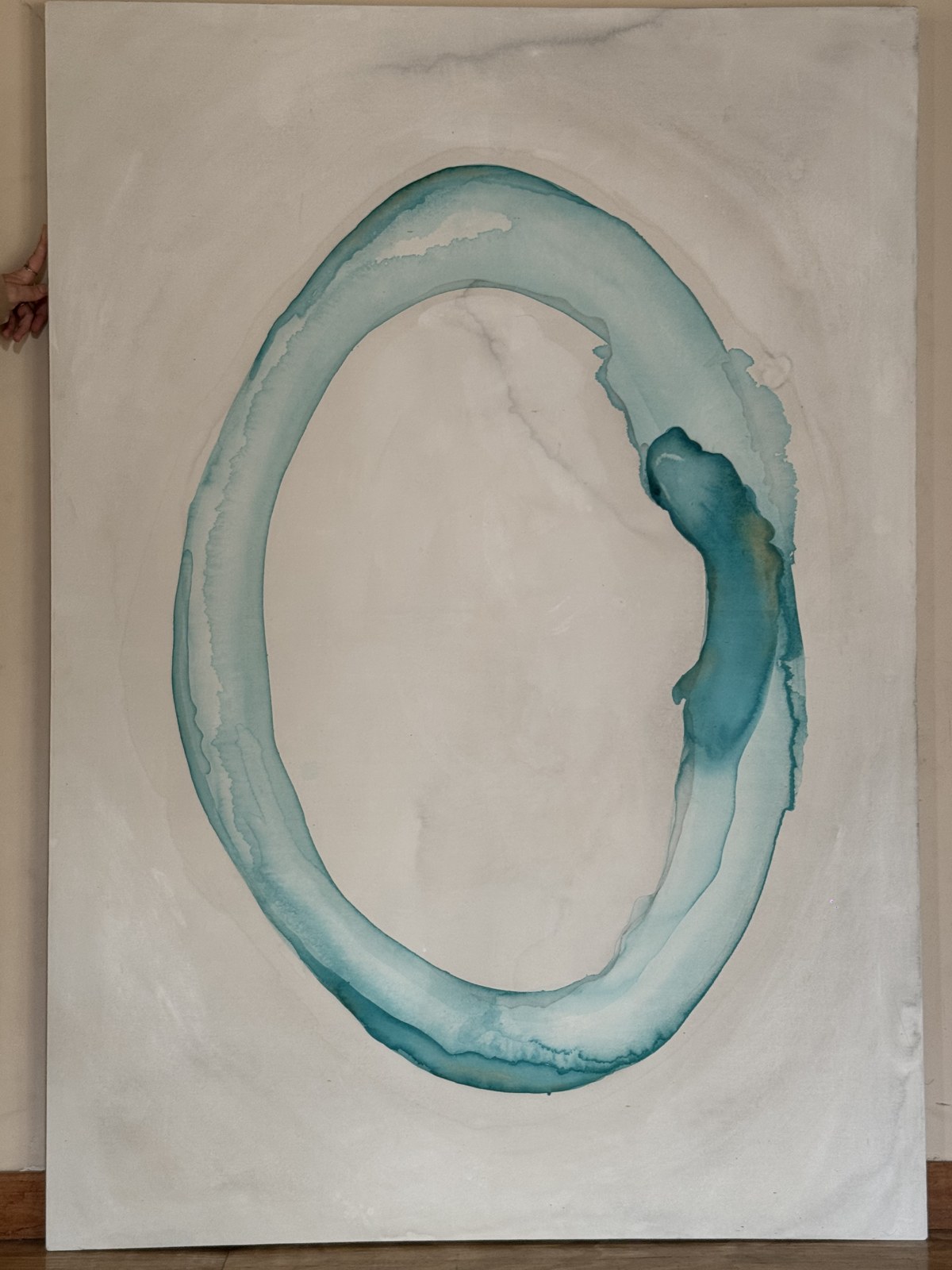 Original painting by Brenda Rodríguez — teal watercolour ring on cream canvas